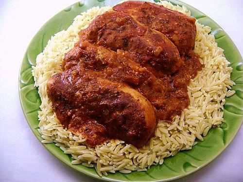 /><br/> <br/> <br/> When I saw Cat Cora serve this dish on the Oprah show a while back, I knew I had to find the recipe and try it. It looked so good on the show it made my mouth water-and Oprah along with Tyler Florence and Curtis Stone were raving about it.<br/> <br/> It didn't disappoint AT ALL! Cat used chicken on the bone-she suggested getting the family pack of cut up chicken, but all I had was boneless chicken breasts and thighs so that's what I used here.<br/> <br/> The cinnamon rub adds SO much flavor to the chicken and the simple sauce goes together in a snap. The aroma from the kitchen while this is cooking? Oh my-it makes waiting for dinner not too easy...but the wait is so worth it. This dish is DELICIOUS-and SO easy too.<br/> <br/> <br/> Carol</span></div> <div><span style=